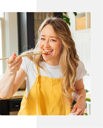Sarah Bond tasting a recipe from the meal plan.